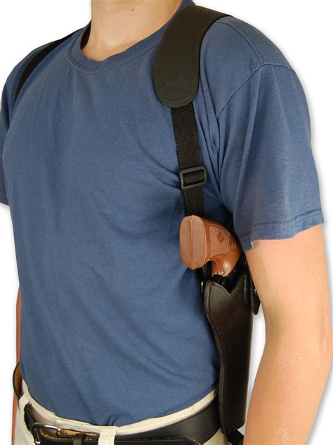 BONUS: Shoot better. . Shoulder holster for suppressed pistol